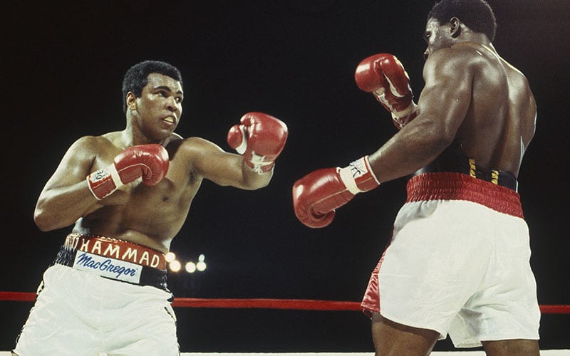 Muhammad Ali throws a left hook and misses Trevor Berbick at the Queen Elizabeth Sports Centre on December 11, 1981 in Nassau, Bahamas. Berbick defeated Ali in the tenth round. (Focus on Sport via Getty Images)
