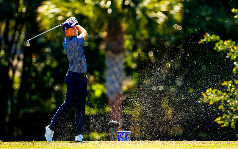 Webb Simpson of the United States plays his shot from the 14th tee during the first round of the RBC Heritage at Harbour Town Golf Links in Hilton Head Island, South Carolina. (Photo by Kevin C. Cox/Getty Images) on a day when a player tests positive for coronavirus